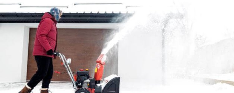 man-using-red-snowblower-machine-outdoor-removing-2022-09-15-01-12-52_sm (1)